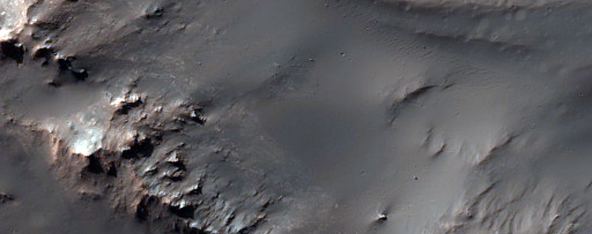 Well-Preserved 15-Kilometer Impact Crater Northwest of Hellas Planitia