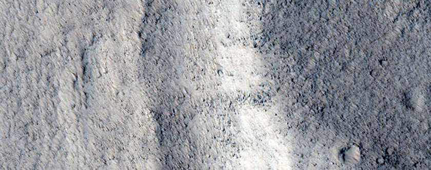 Degradation of Old Crater Rim on Northwest Slope of Acheron Fossae