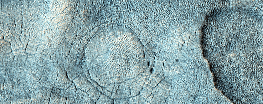 Deformed Craters with Light-Toned Fill Material