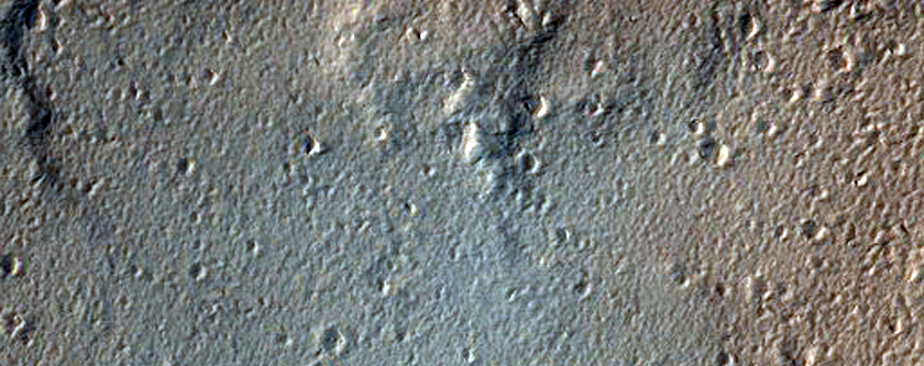 Mounds among Flows of Northeast Tharsis
