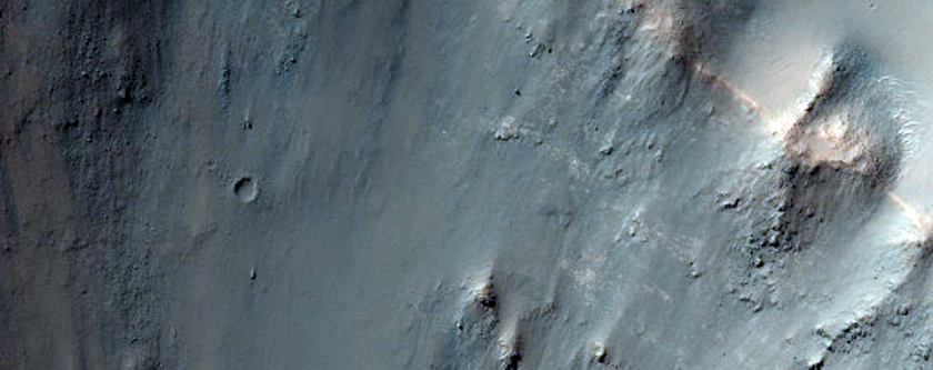 Central Structure and a 5-Kilometer Diameter Crater inside a Larger Crater