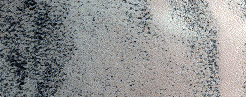 Persistent Northern Plains Ice Deposit Leeward of Crater