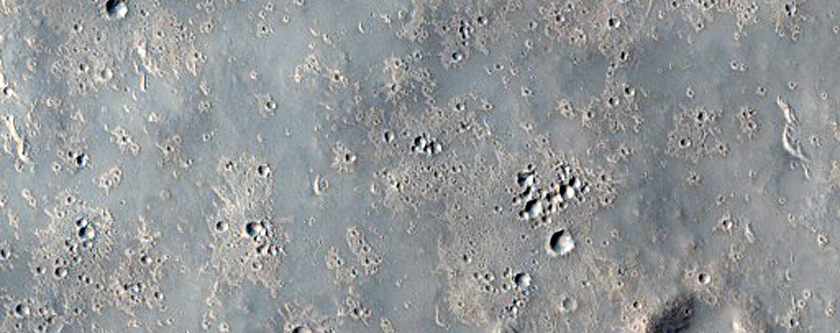Wrinkle Ridge and Impact Crater Intersection
