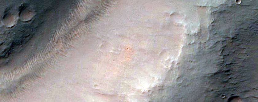 Bedrock Exposed in Cluny and Globe Craters