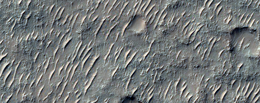 Possible Pyroxene in Crater Northwest of Hellas Planitia