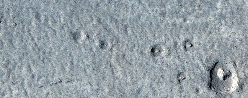 Crater Floor Textures Seen in MOC Images SP2-45003 and E10-04013
