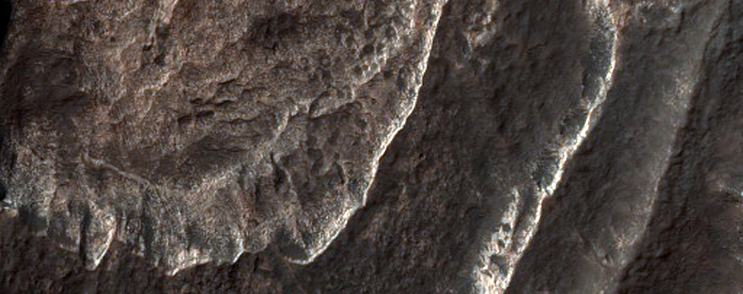 Light-Toned Layered Deposits on Northern Edge of Hellas Planitia