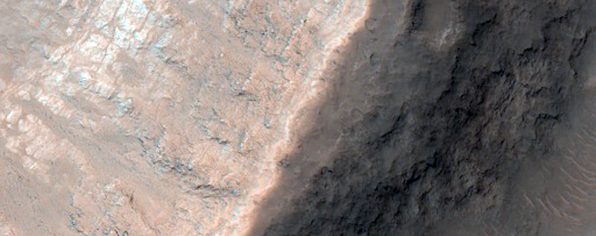 Layers Exposed in Wall of Crater in the Floor of Hydaspis Chaos