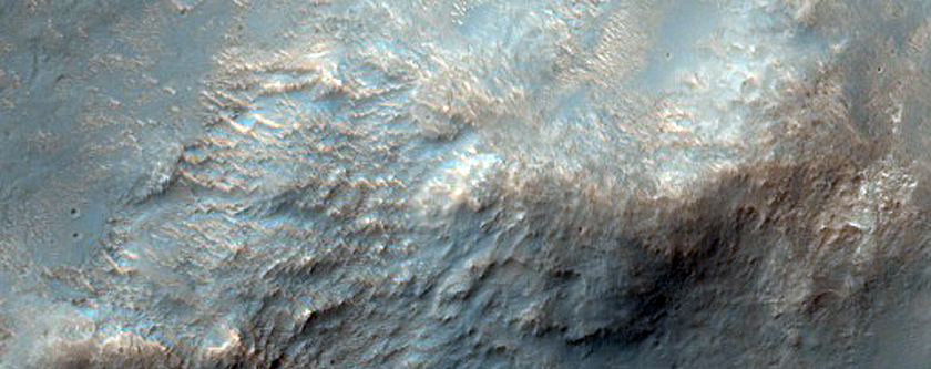 Possible Phyllosilicates in Crater Ejecta