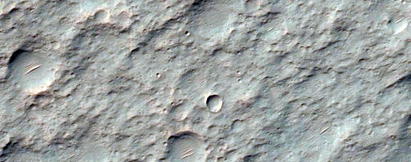 Well-Preserved 30-Kilometer Diameter Impact Crater with Bedrock Exposures