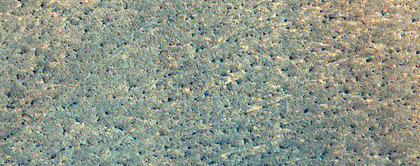 Persistent Northern Plains Ice Deposit in Scandia Cavi