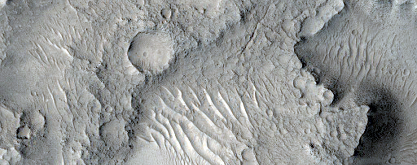 Central Uplift and Layered Materials on Crater Floor