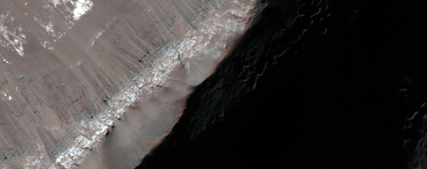 Light-Toned Crater Wall Outcrop in Crater with Gullies