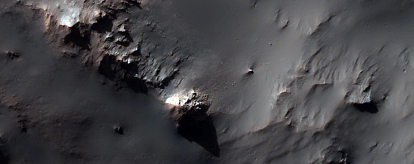 Well-Preserved 15-Kilometer Diameter Impact Crater Northwest of Hellas Plan