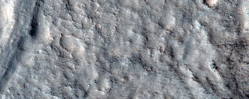 Shallow Channel Cutting through a Crater in CTX Image