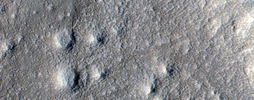 Galaxias Fossae and Adjacent Disrupted Terrain