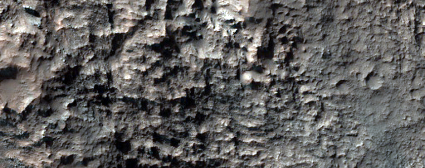 Bedrock Exposures Northwest of Hellas Planitia