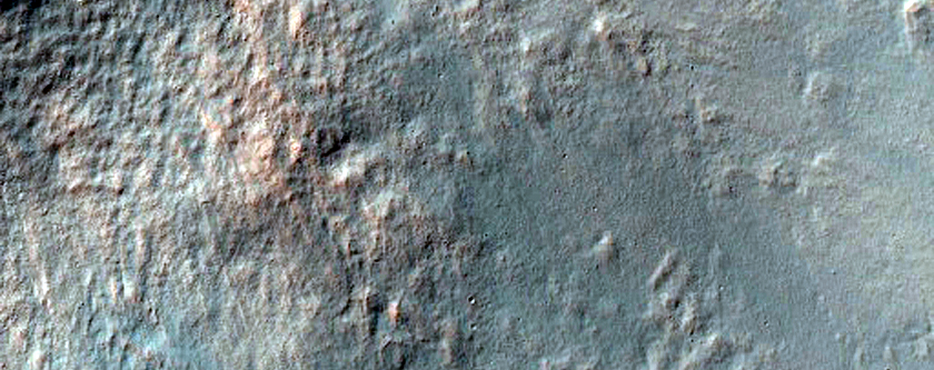 Small Fresh Crater on Floor of Larger Crater