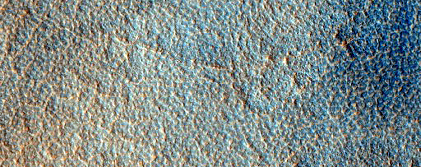 Patch of Light-Toned Material on Floor of Crater