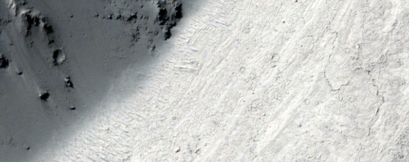 Flow Into Breached Crater in Central Elysium Planitia