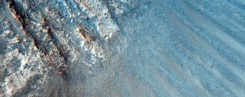 Crater Wall Exposing Layers in Mesa in Acidalia Planitia