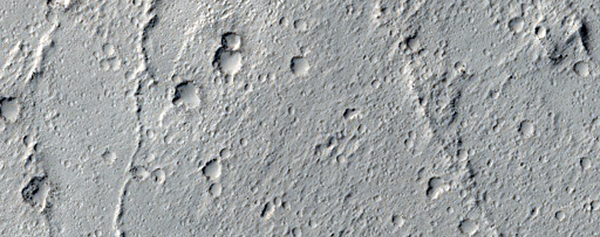 Zunil Crater Ray Formed within a Dusty Region