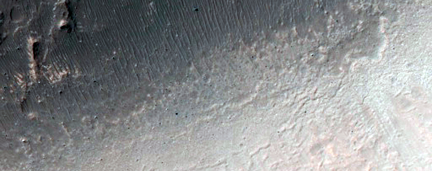 Light and Dark Layers Exposed in Crater Wall