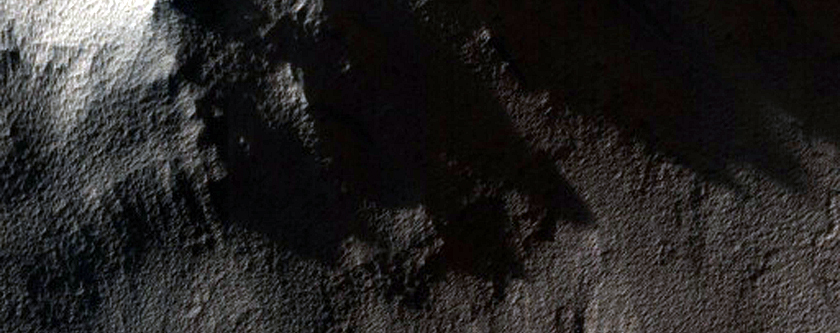 Exposed Layers and Impact Crater Cut by Depression Wall
