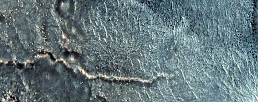 Central Structure and Layering of a Large Impact Crater