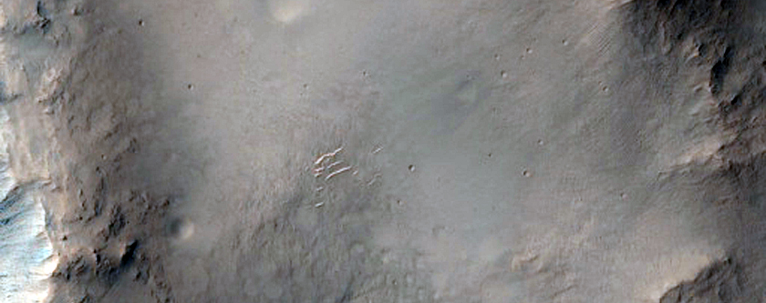 Impact Craters of Similar Diameter Separated by Ridge