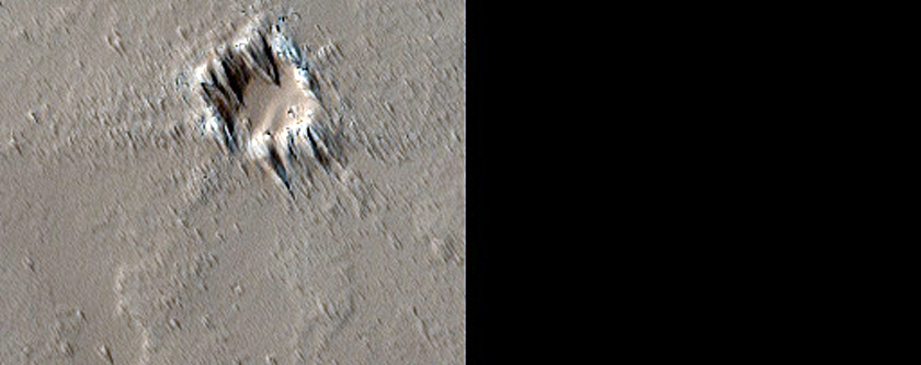 Dusty Shield Volcano in Tharsis Region