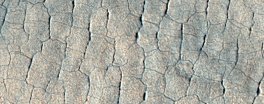 Polygons and Pits in Utopia Rupes
