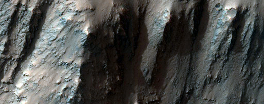 Small Cut Crater in Capri Chasma