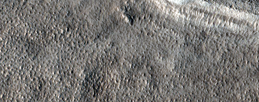 Impact Crater and Plains North of the Acheron Fossae Region
