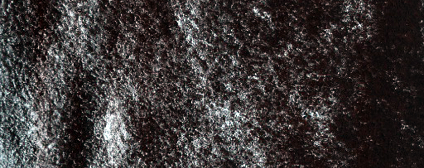 Persistent Northern Plains Ice Deposit in Louth Crater