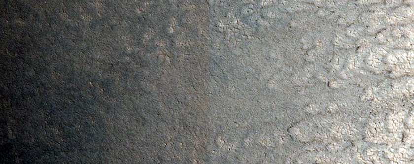 Darkening of Light-Toned Patches on Northern Crater Wall