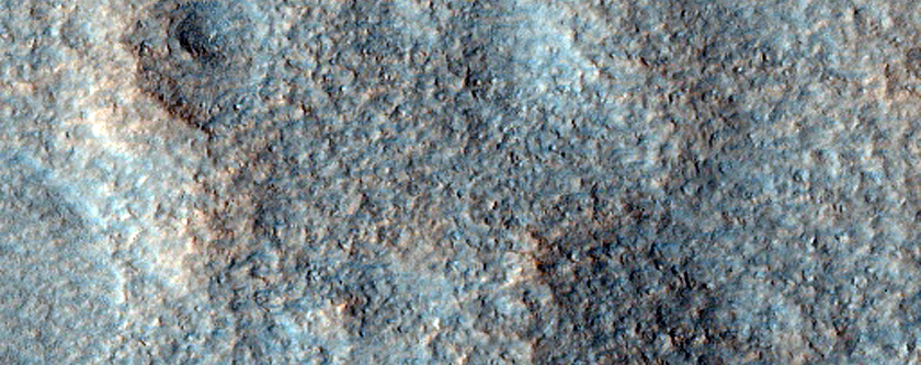 Possible Phyllosilicates in Ejecta From Stokes Crater