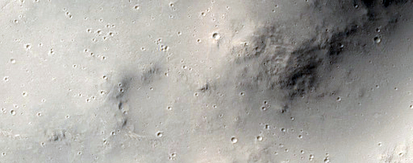 Channel Entering Crater near Dichotomy Boundary