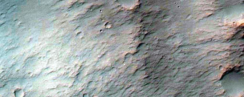 Bedrock Exposures in Well-Preserved 30-Kilometer Diameter Crater