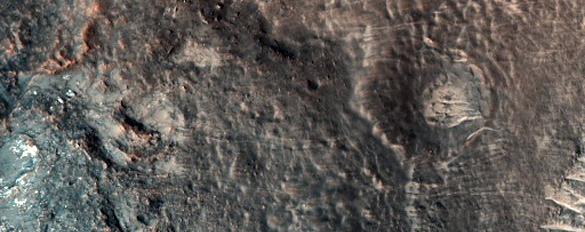 Central Peak and Ring with Megabreccia in 13-Kilometer Diameter Crater