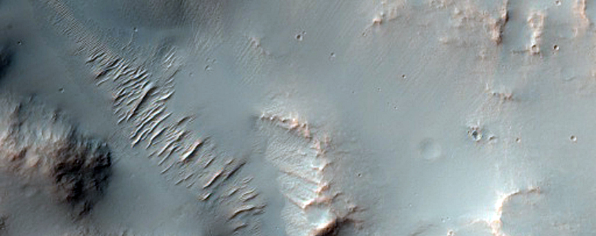 Valley Breaching Oblique Crater Rim