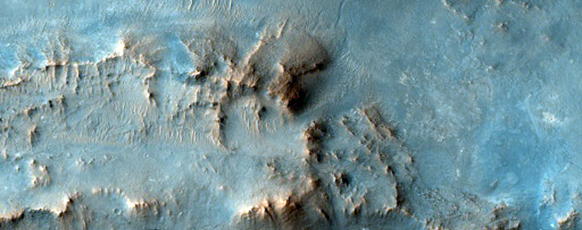Interior Wall and Ejecta of 20-Kilometer Diameter Crater near Toro Crater