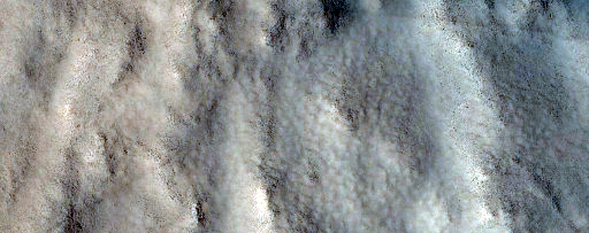 Mass Movement on Wall of Crater in Lyot Crater Ejecta Blanket