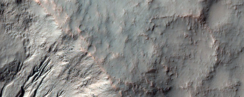 Gullies in Crater and Trough near Mariner Crater