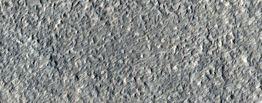 Cross-Cutting Linear Ridges and Associated Gully-Like Depressions