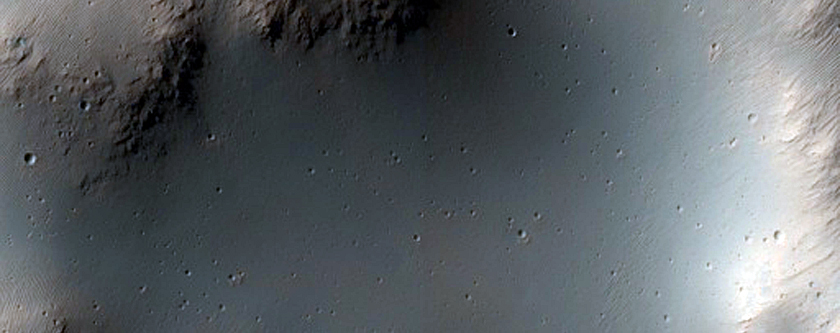 Fluvial Features at Intersection of Two Craters