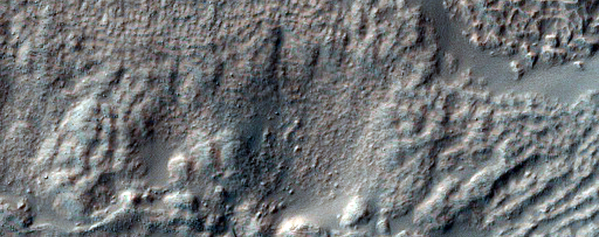 Volatiles and Gullies in Avire Crater