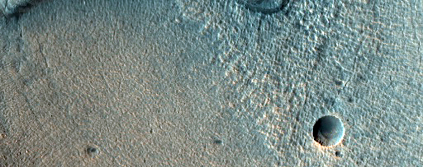 Eroded Layered Deposits near Ismenius Lacus