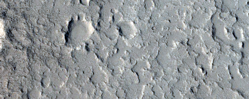 Trough and Flows on East Side of Elysium Region Rise