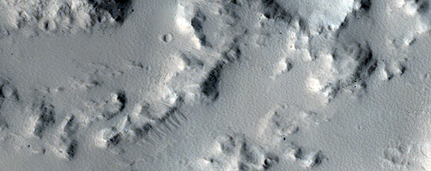Crater Rim and Layered Ejecta near Kasei Valles